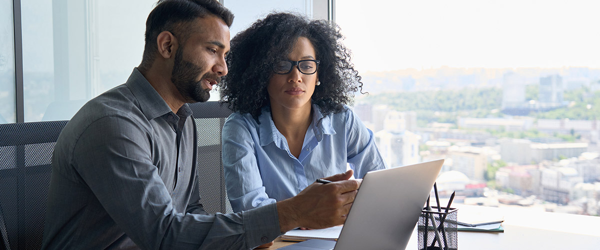 Finance professionals reading new HMRC guidance