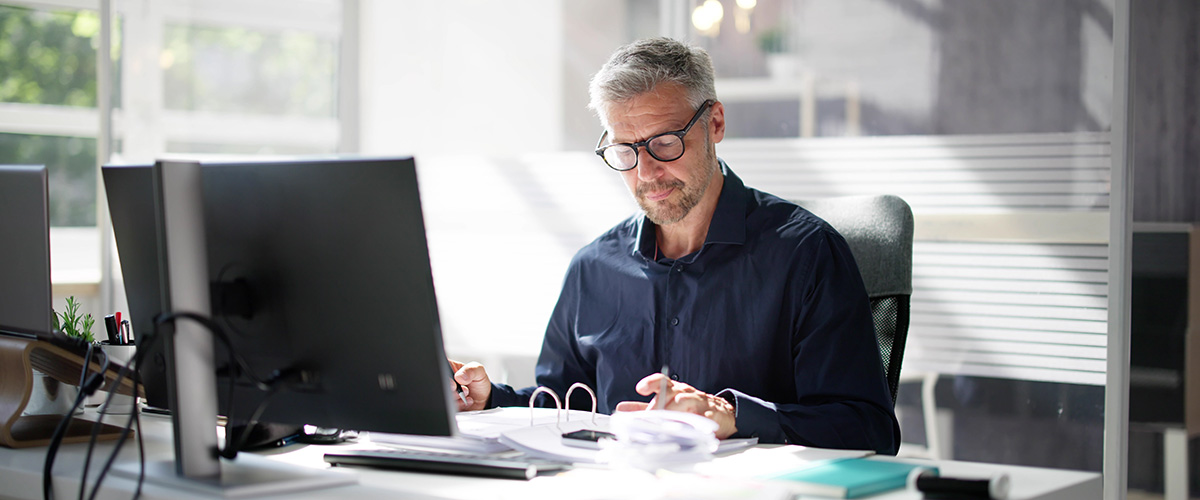 A professional reviewing his personal tax obligations