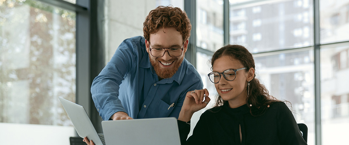 Two professionals discussing a charity merger