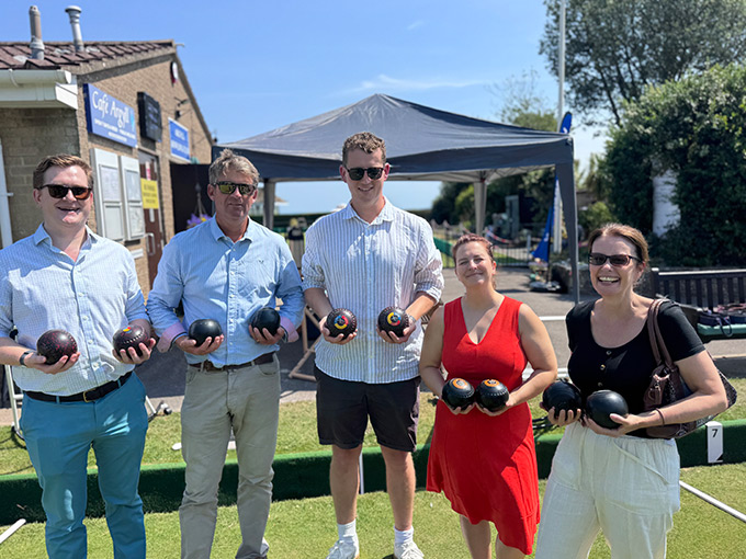 Saffery takes to the green for annual bowling networking event